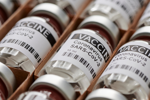 Photo credit: coronavirus vaccine. sars-cov-2 COVID-19. Some ampoules with ncov-2019 vaccine in a box. to fight the coronavirus pandemic. © MFoto. Shutterstock.com